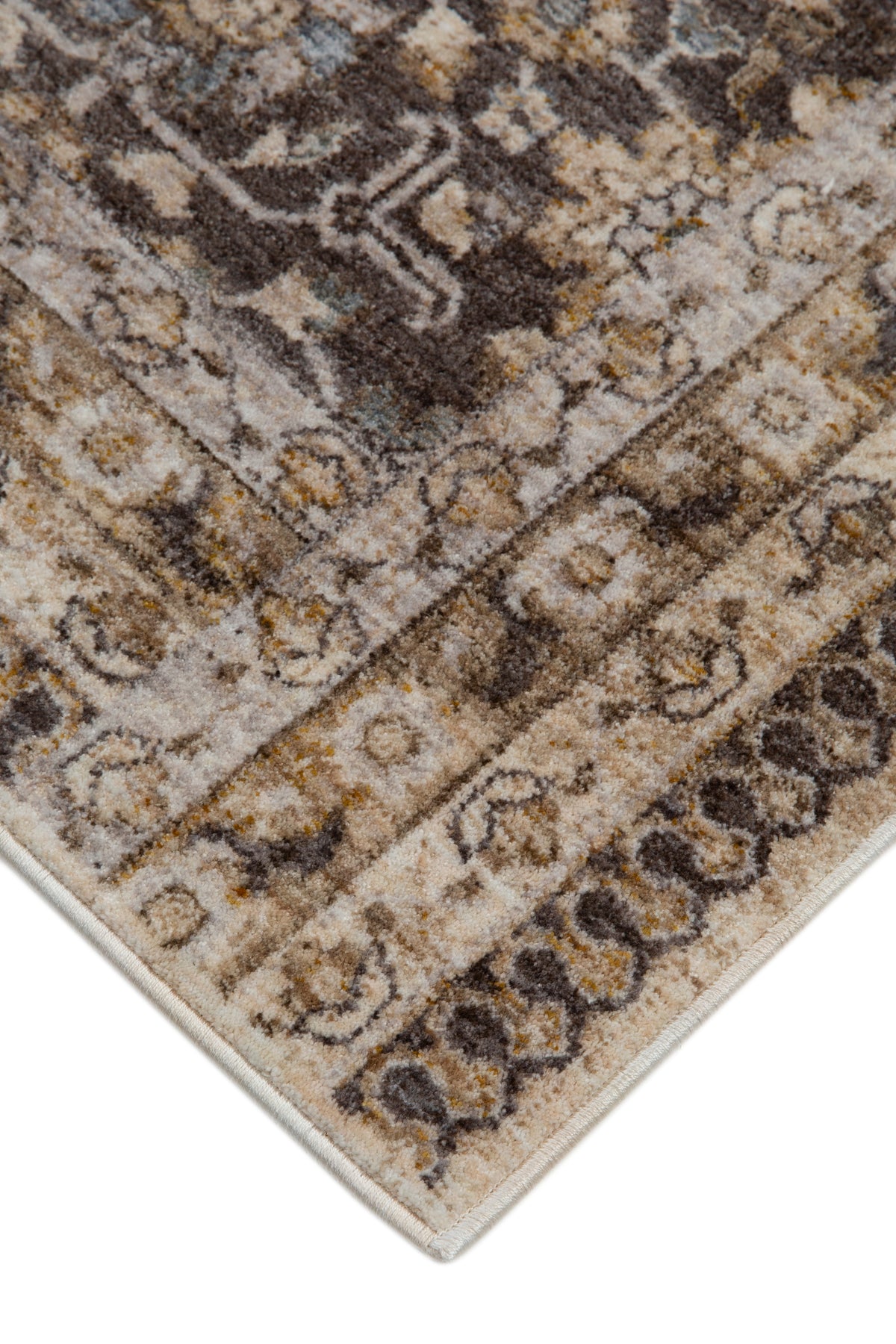 Vintage-style area rug with beige and brown geometric patterns and ornate borders