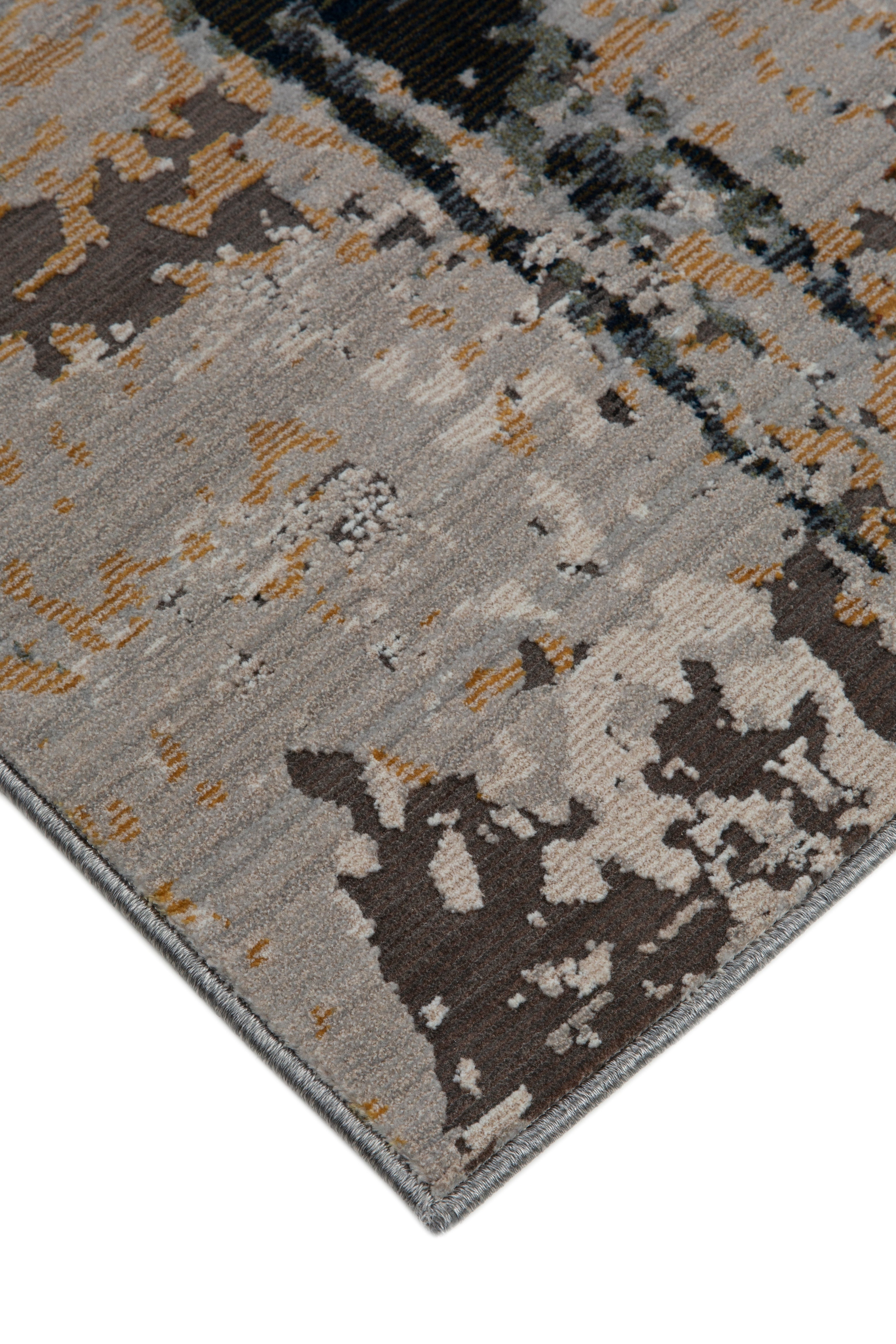 Abstract distressed rug with gold, gray, and black splatter pattern design