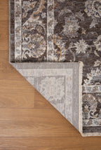 Traditional floral rug with brown center, ornate cream border and botanical pattern design