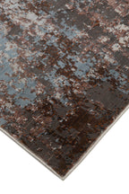 Modern distressed rug with brown, cream and blue abstract texture pattern