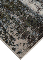 Abstract distressed rug with blue, grey and white textured pattern