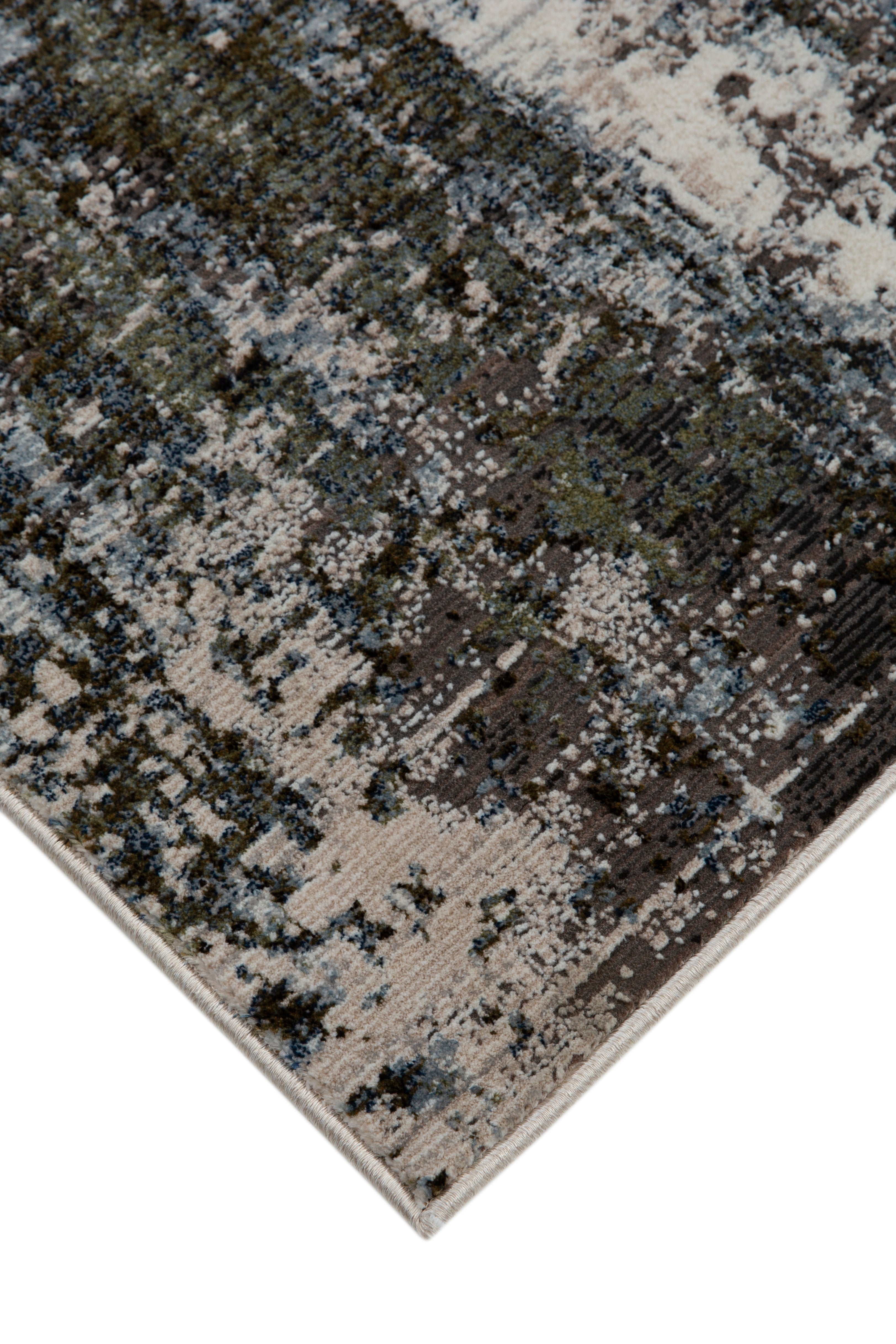 Abstract distressed rug with blue, grey and white textured pattern