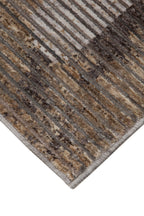 Modern geometric striped rug in grey, taupe and cream tones with distressed texture