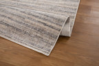Beige and grey textured area rug with horizontal striped pattern