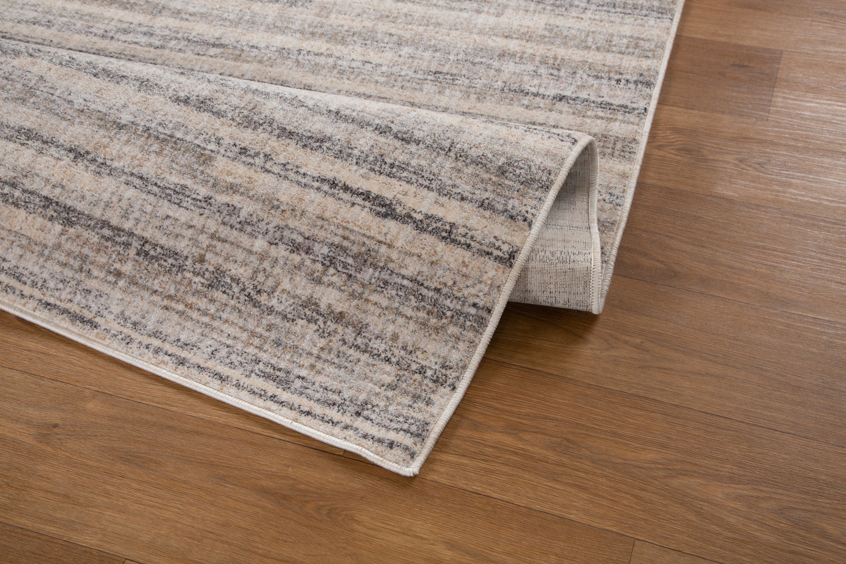 Beige and grey textured area rug with horizontal striped pattern