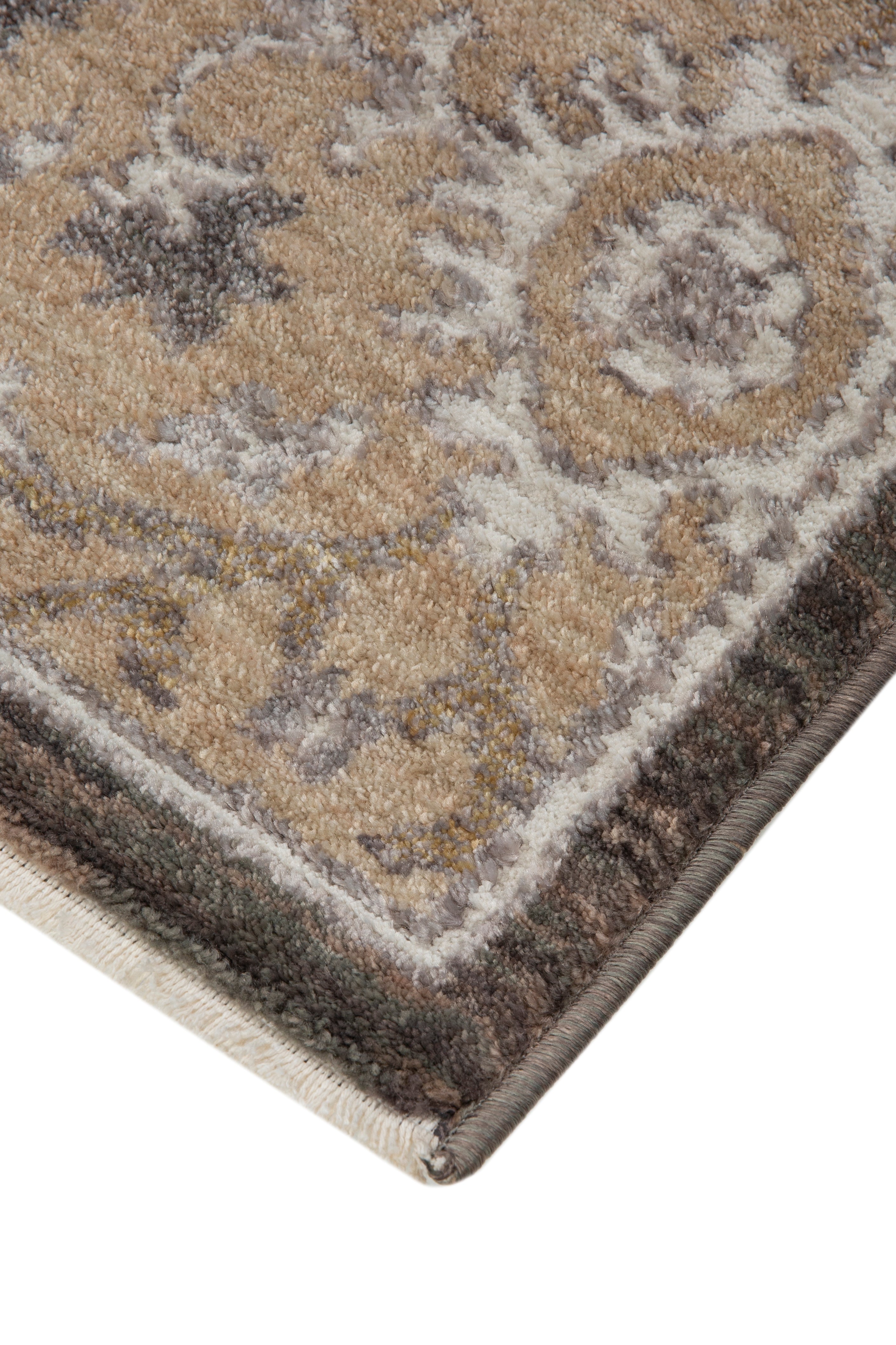 Charcoal and beige damask patterned rug with ornate floral motifs and border