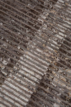 Modern geometric striped rug in grey, taupe and cream tones with distressed texture
