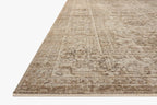 Beige traditional Persian-style rug with intricate geometric and floral patterns throughout