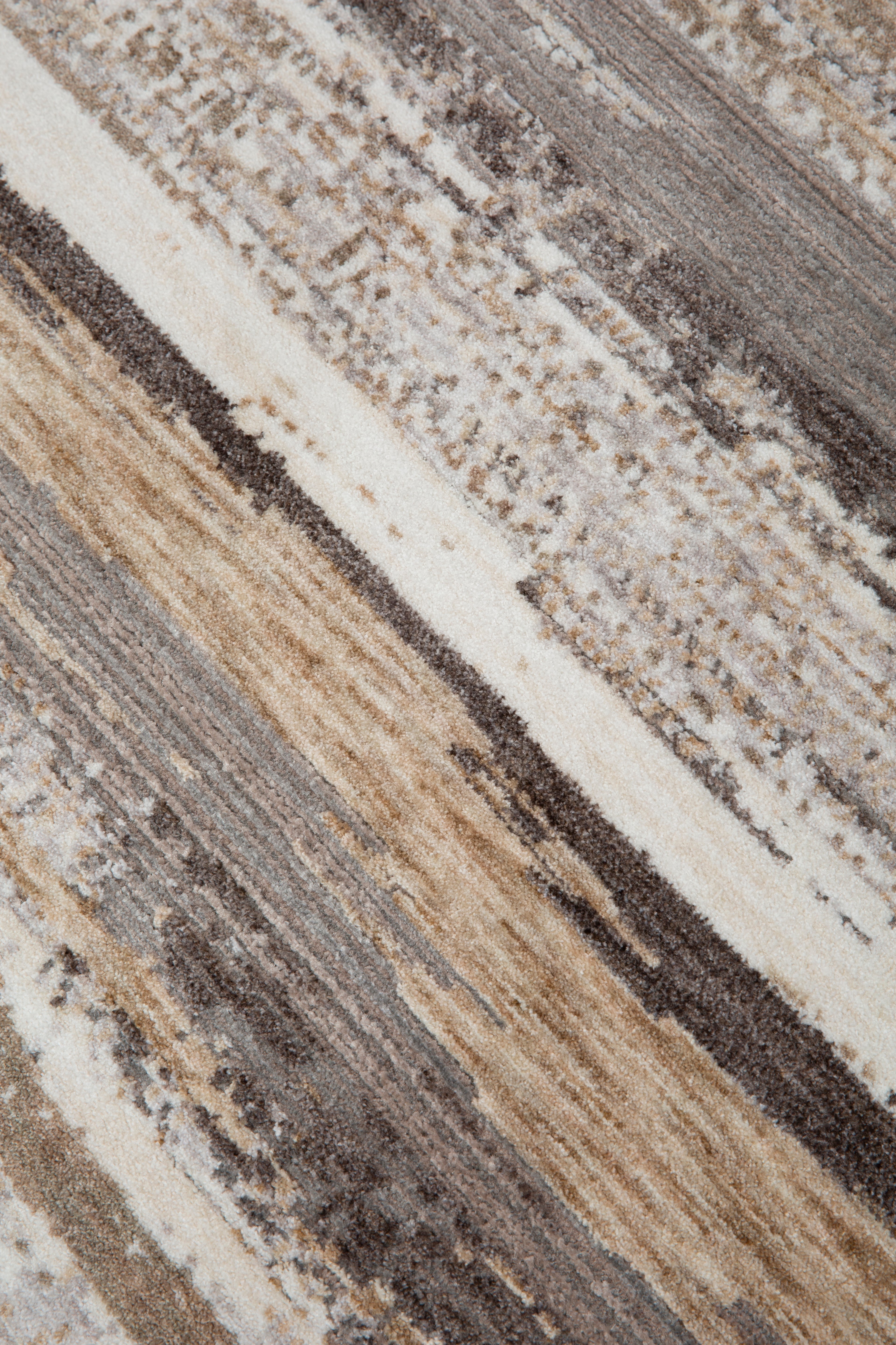 Distressed striped rug with weathered wood texture in brown and cream tones