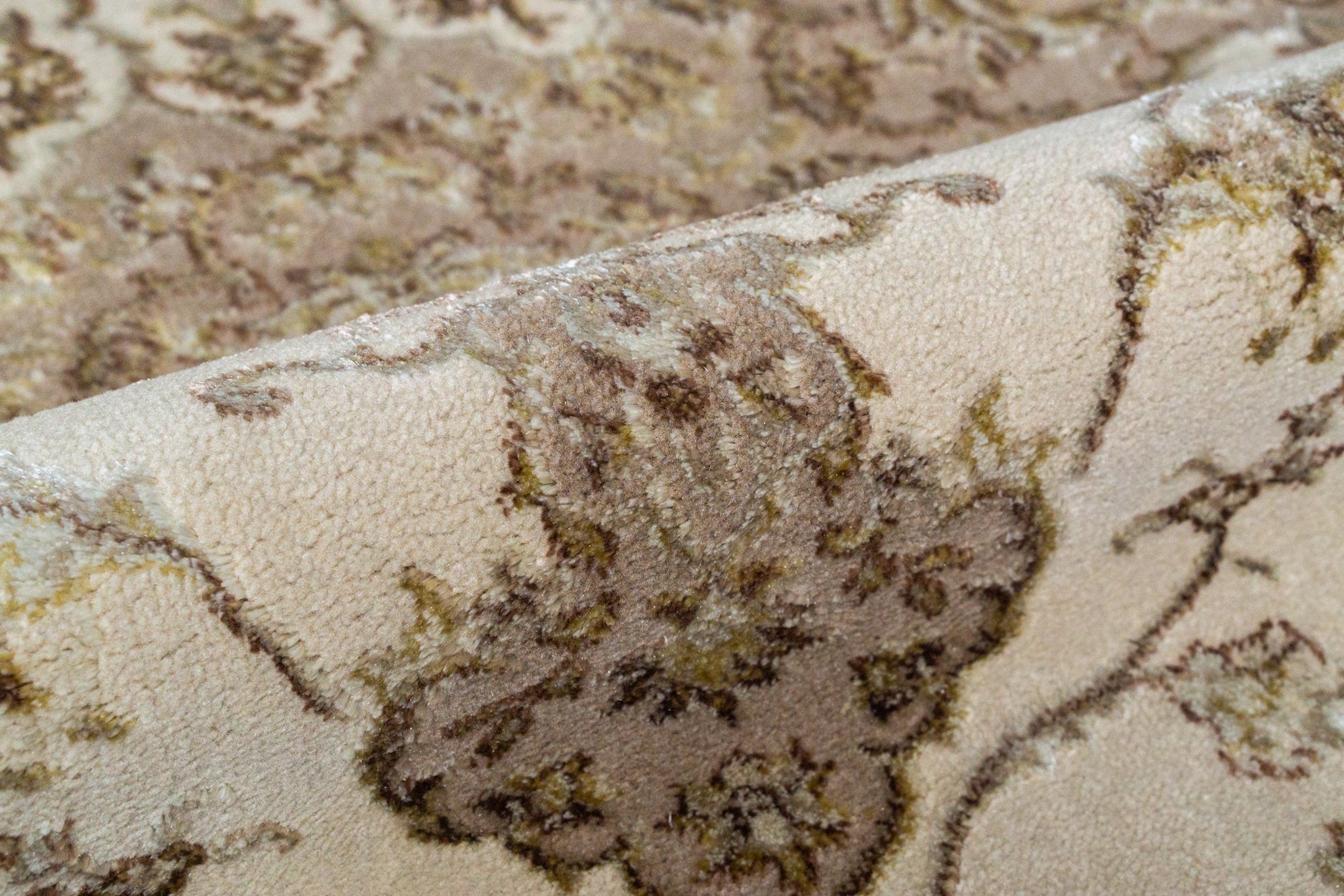 Vintage-style beige and brown medallion rug with ornate floral border pattern