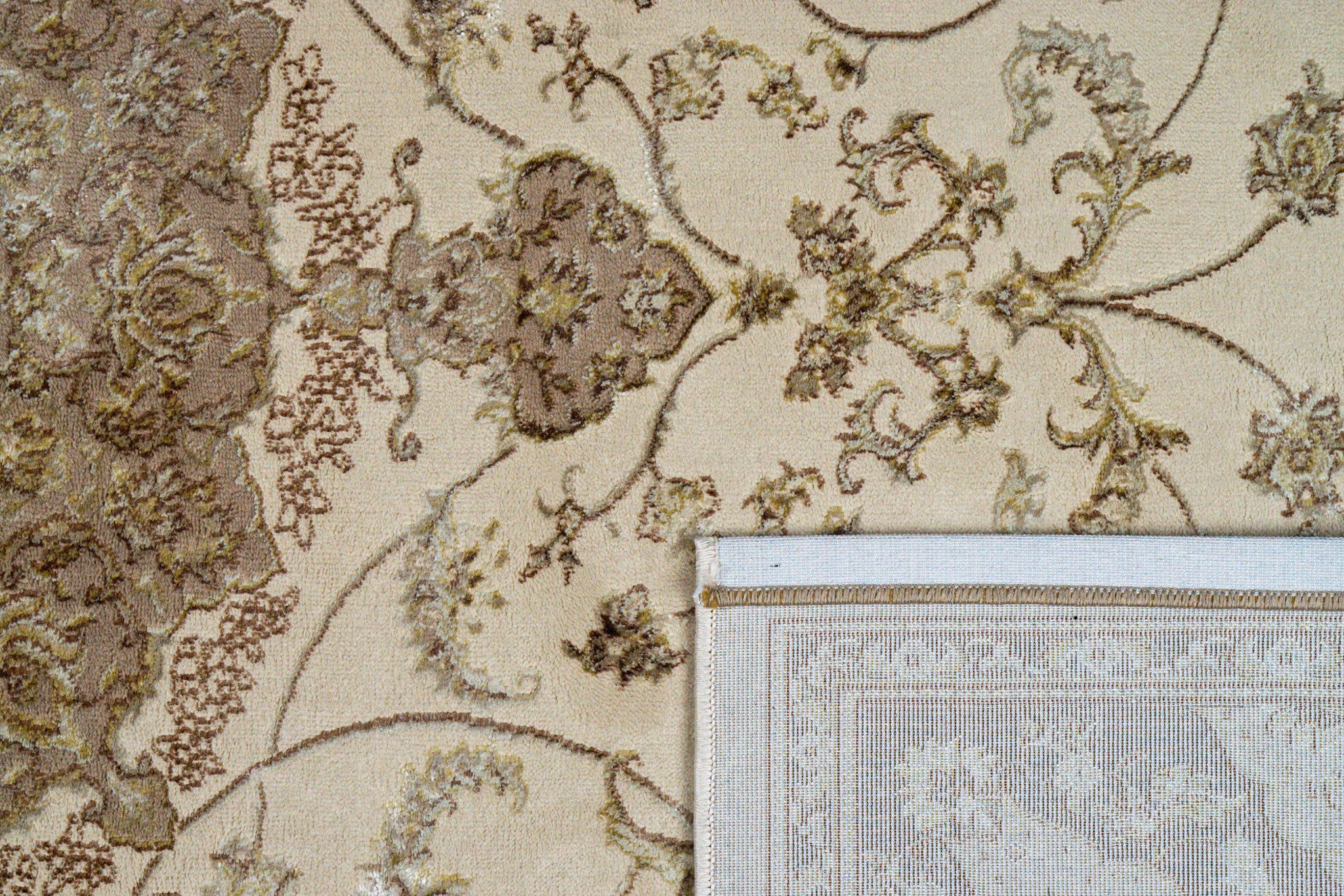 Vintage-style beige and brown medallion rug with ornate floral border pattern