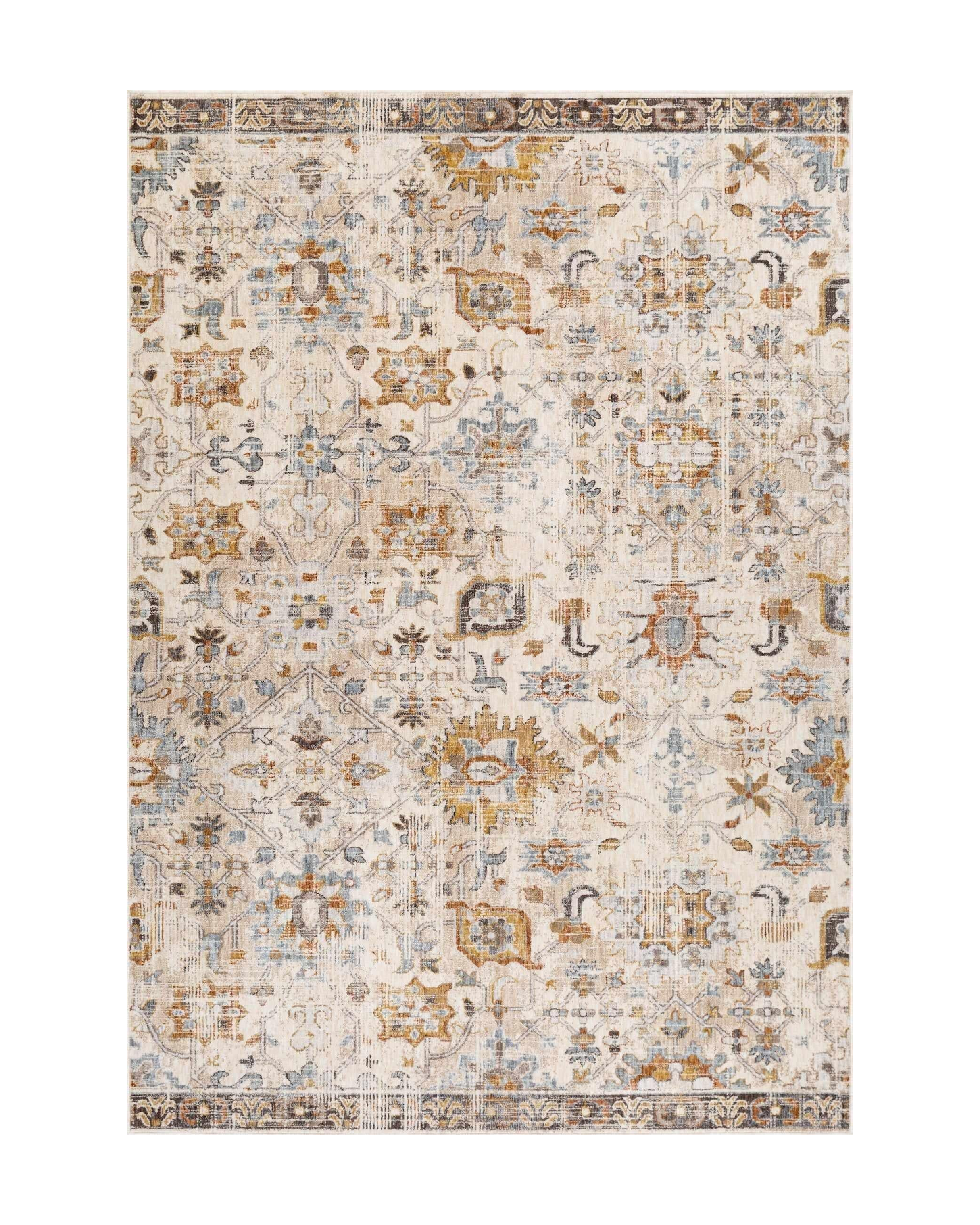Vintage-style rug with intricate geometric patterns in cream, gold and blue tones