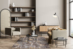 Abstract distressed rug with gold, grey, and brown pixelated pattern texture