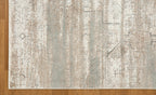Vintage beige and grey distressed geometric patterned area rug with worn texture