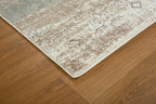 Vintage beige and grey distressed geometric patterned area rug with worn texture