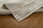 Vintage beige and grey distressed geometric patterned area rug with worn texture