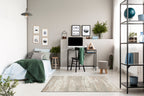 Vintage beige and grey distressed geometric patterned area rug with worn texture