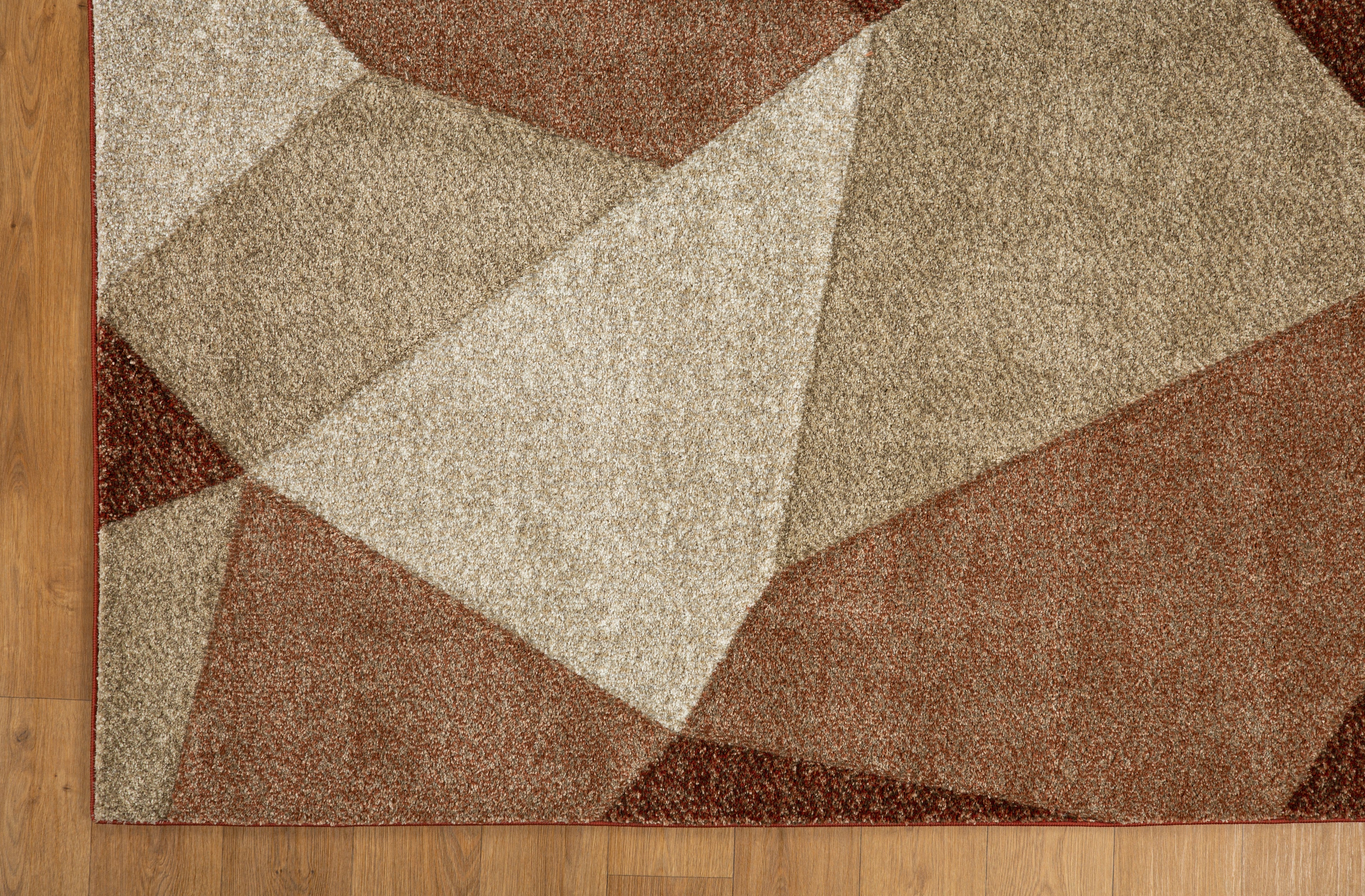Brown and cream geometric diamond pattern area rug with textured weave