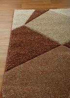 Brown and cream geometric diamond pattern area rug with textured weave