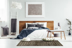 Brown and cream geometric patterned rug with textured weave design