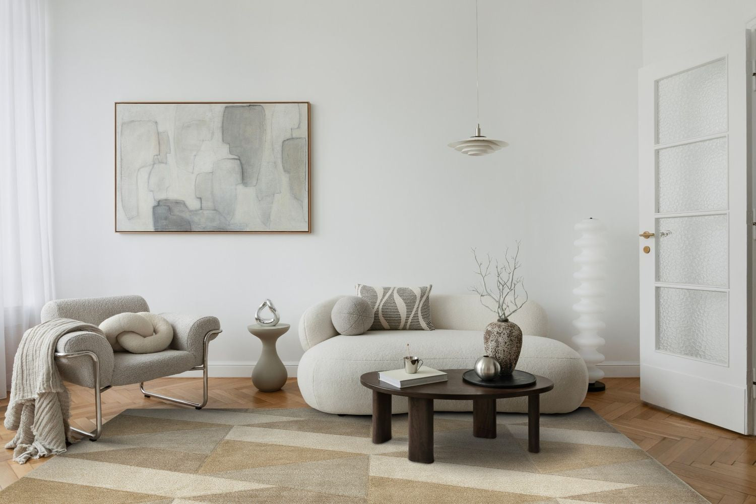 Geometric beige and cream triangle pattern rug with textured wool pile