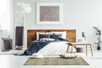 Neutral beige geometric patterned rug with textured woven appearance and diamond motifs