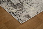 Modern distressed rug with abstract geometric pattern in cream and charcoal gray tones