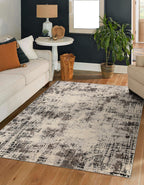 Modern distressed rug with abstract geometric pattern in cream and charcoal gray tones
