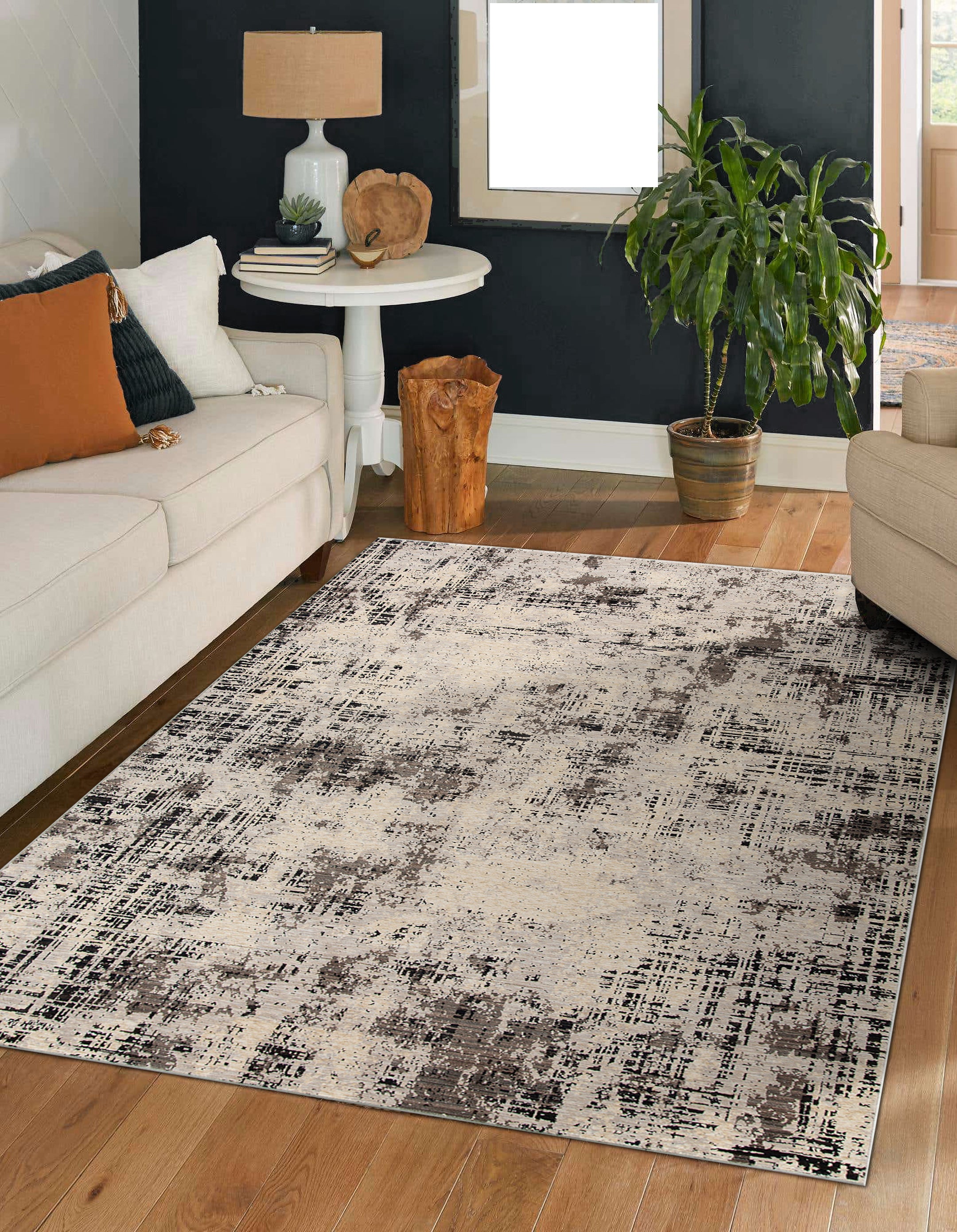 Modern distressed rug with abstract geometric pattern in cream and charcoal gray tones
