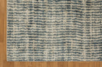 Grey and cream striped textured rug with abstract linear pattern design