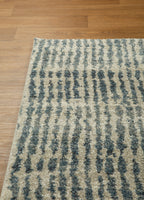 Grey and cream striped textured rug with abstract linear pattern design