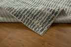 Grey and cream striped textured rug with abstract linear pattern design