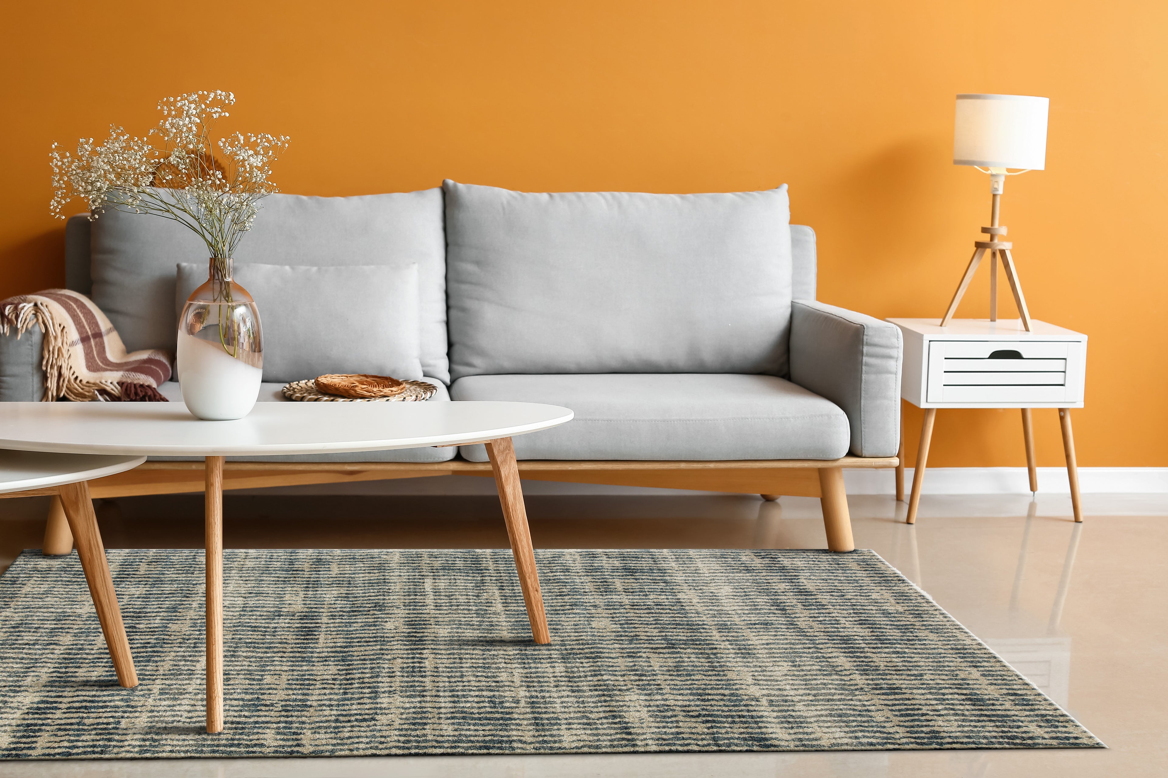 Grey and cream striped textured rug with abstract linear pattern design