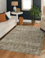 Neutral textured area rug with vertical striped pattern in beige and green tones