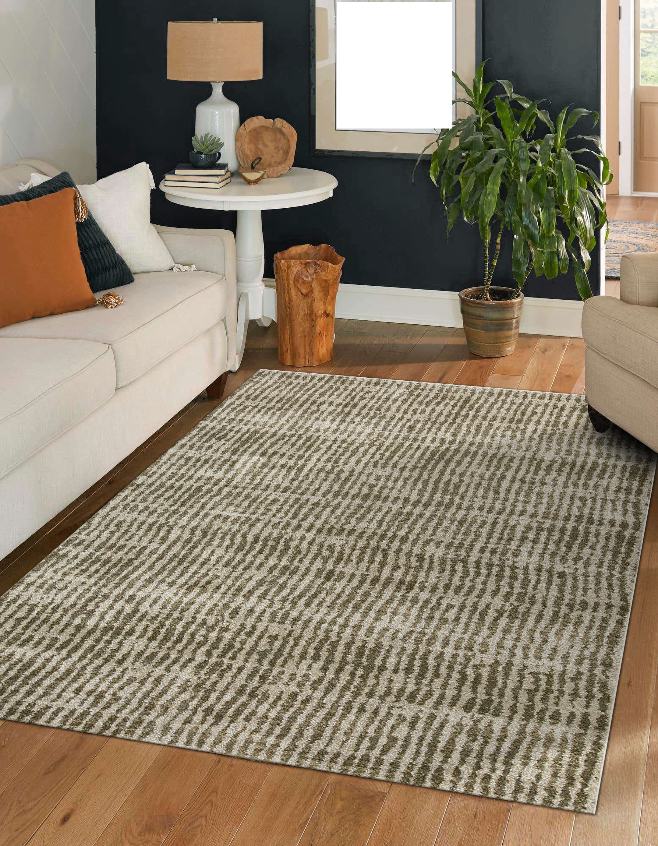 Neutral textured area rug with vertical striped pattern in beige and green tones
