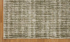 Neutral textured area rug with vertical striped pattern in beige and green tones