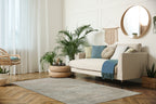 Neutral beige textured area rug with subtle geometric pattern and soft finish
