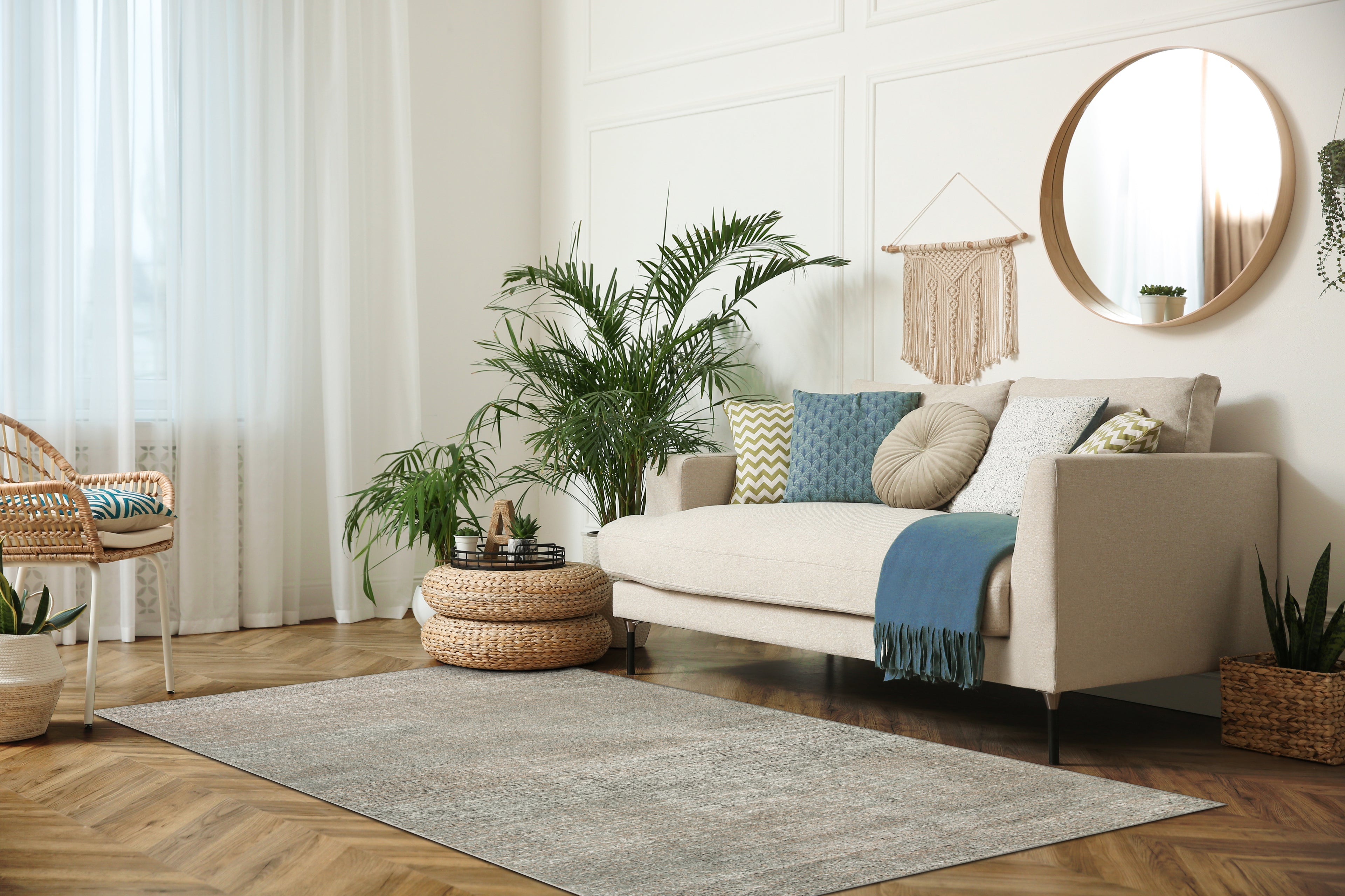 Neutral beige textured area rug with subtle geometric pattern and soft finish