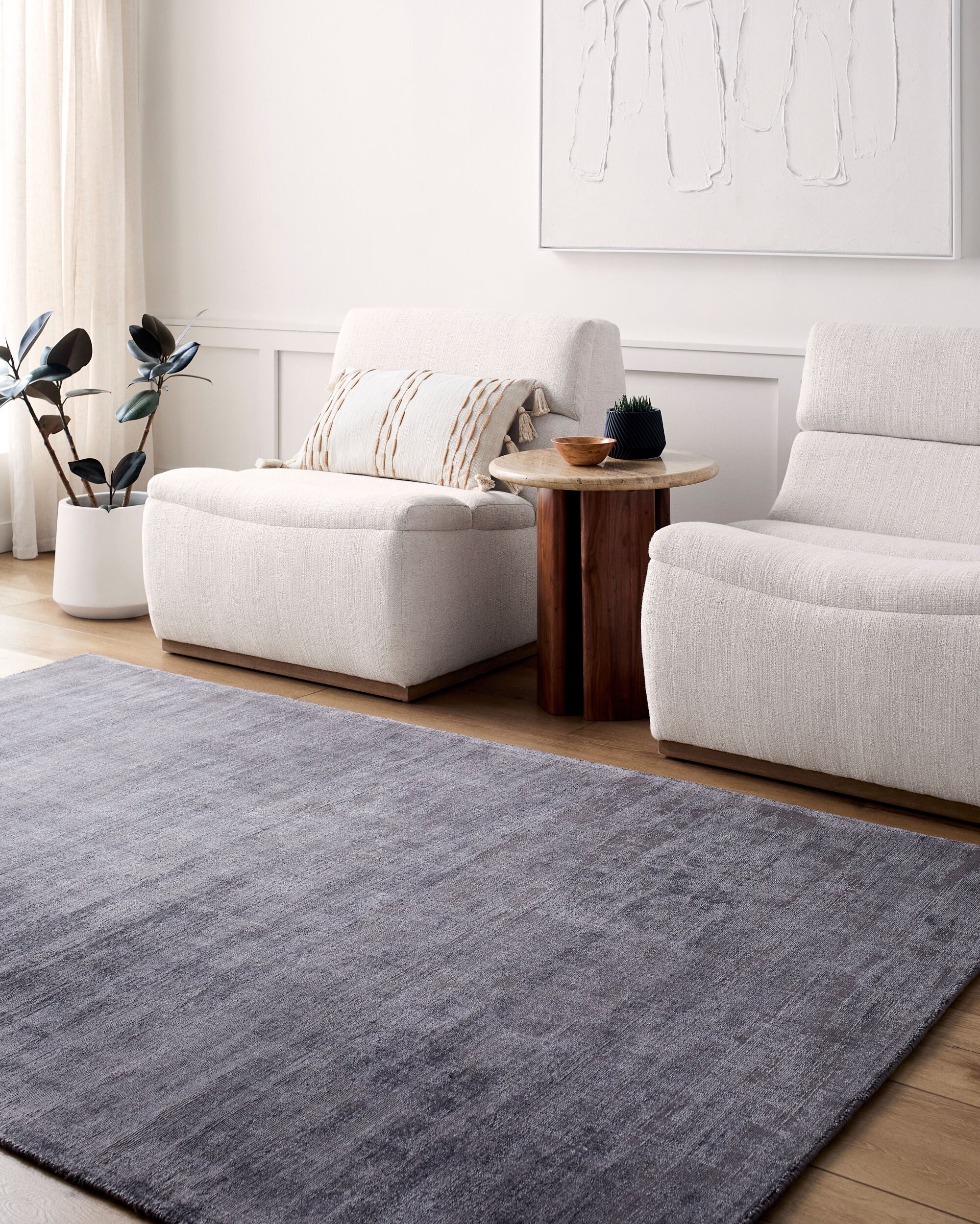 Grey distressed texture rug with subtle worn pattern and matte finish