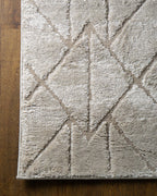 Geometric beige rug with tan diamond and chevron pattern design