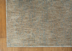 Neutral beige wool rug with subtle textured weave pattern throughout