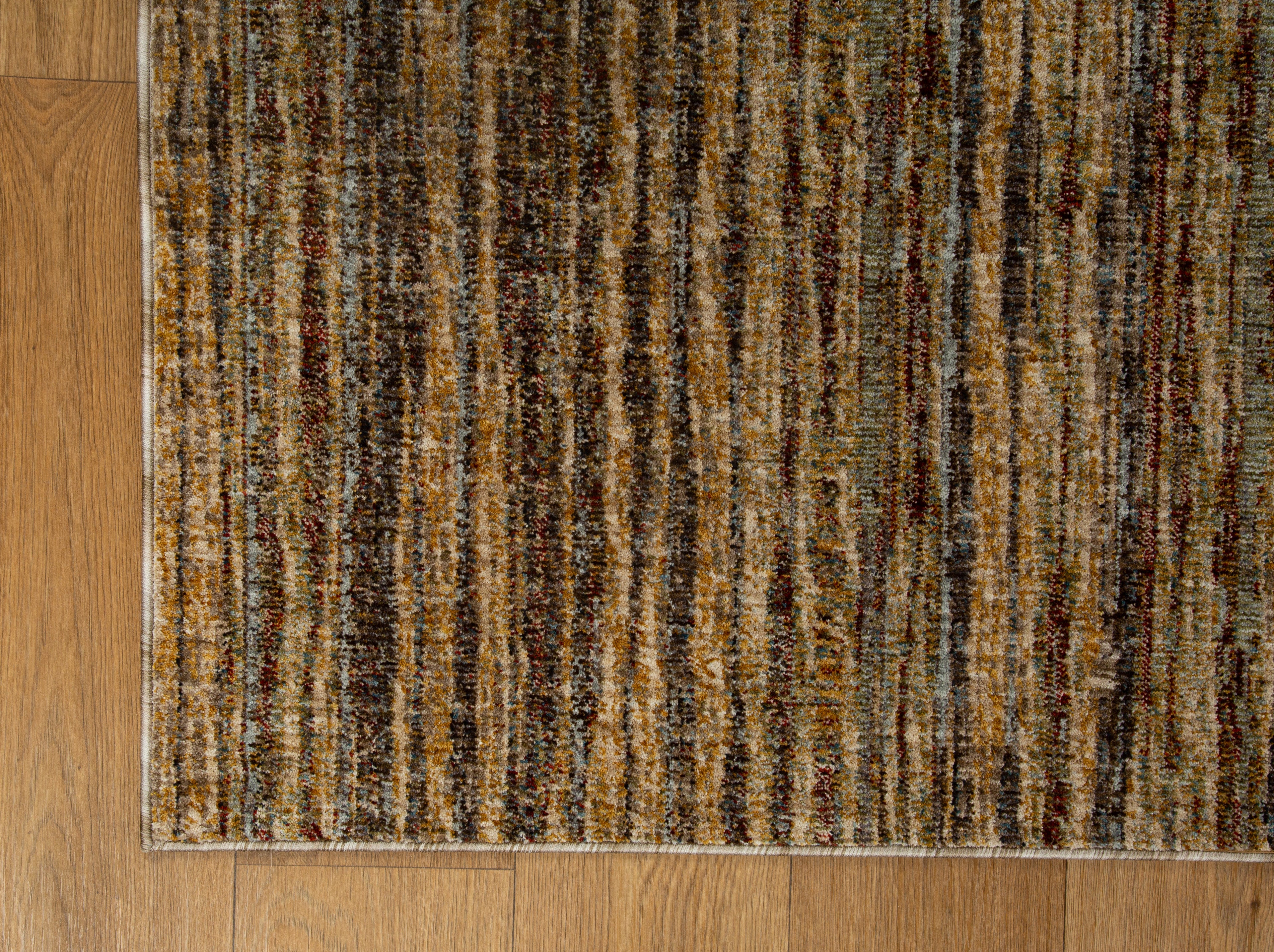 Brown textured area rug with horizontal woven pattern in natural tones