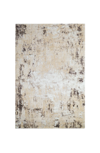 Distressed beige and gray textured rug with mottled vintage pattern