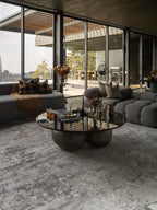 Modern abstract grey and white distressed texture area rug with mottled pattern