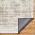 Amara viscose hand-loomed area rug in Ivory White, backing view