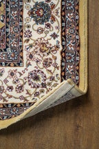 Traditional Persian rug with gold center, cream border and ornate floral medallion pattern