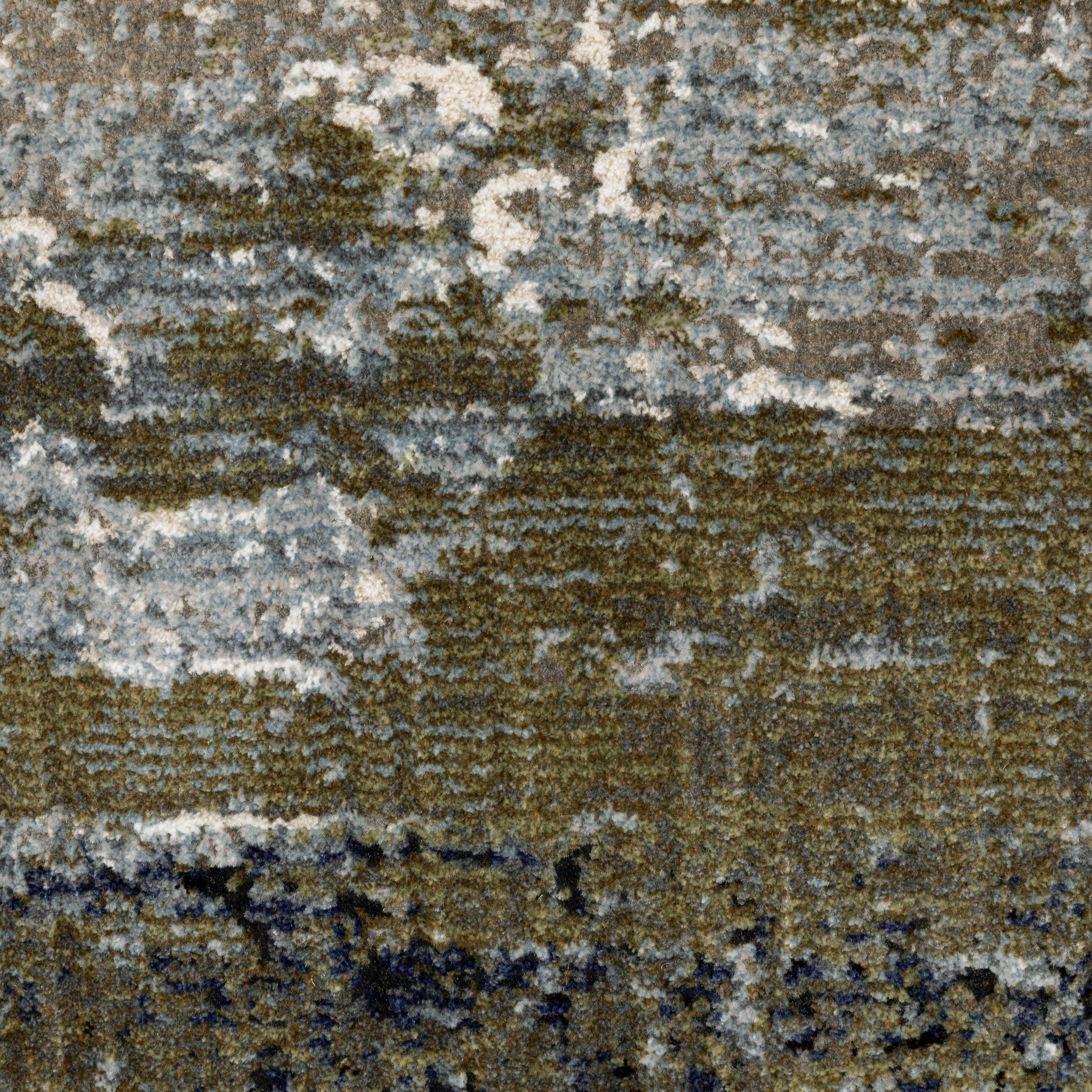 Abstract distressed area rug with grey, olive, and cream mottled texture pattern