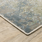 Modern distressed area rug with grey, cream, and olive abstract texture pattern