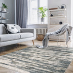 Modern grey and cream striped rug with distressed texture and abstract horizontal pattern