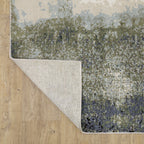Abstract grey and cream distressed rug with textured weathered design